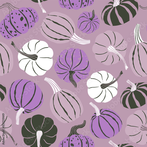 Fun bright pumpkin seamless pattern in purple, pink, lilac colors. Halloween modern repeat pattern for textile and paper design.