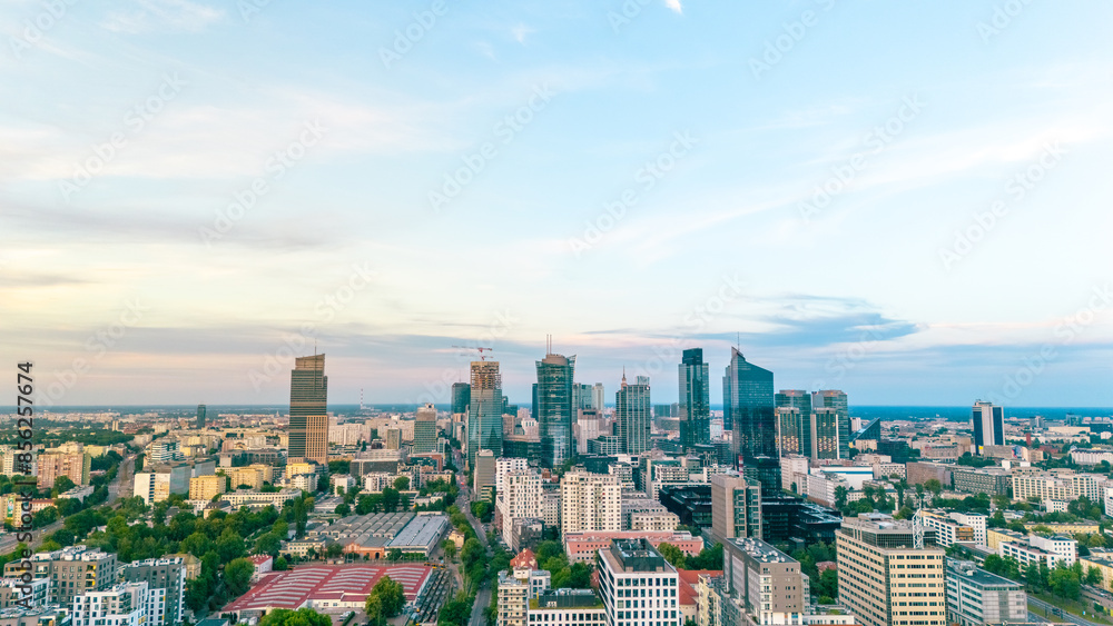 Obraz premium panoramic aerial view of Warsaw city at sunset in summer over the river
