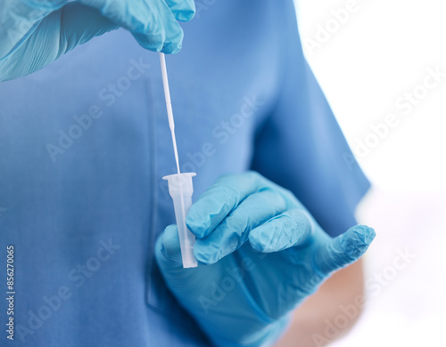 Hands, cotton swab and medical test for FLiRT covid, dna analysis for disease in hospital. Healthcare worker, pathology exam and vaccine research in clinic, latex gloves for safety with virus