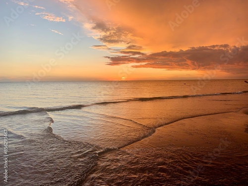 Fiery hues create tranquil skies