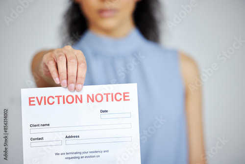 Woman, eviction and notice paperwork in home, homeowner crisis and tenant with legal vacate document. Apartment, finance bankruptcy and failed investment, overdue payment and rent or tenancy problem photo