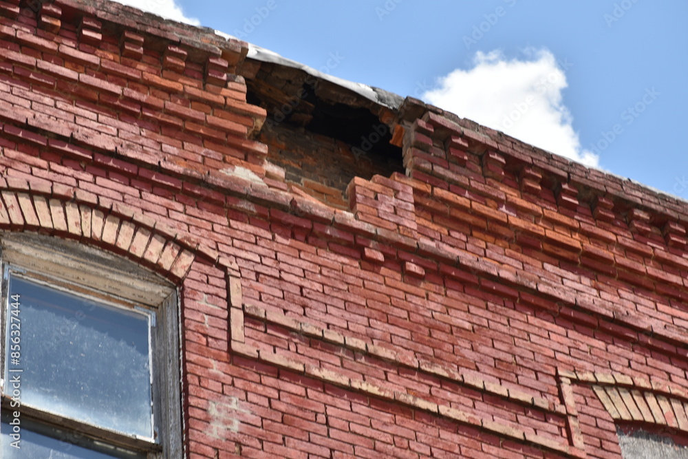 Fototapeta premium Damaged Brick Building