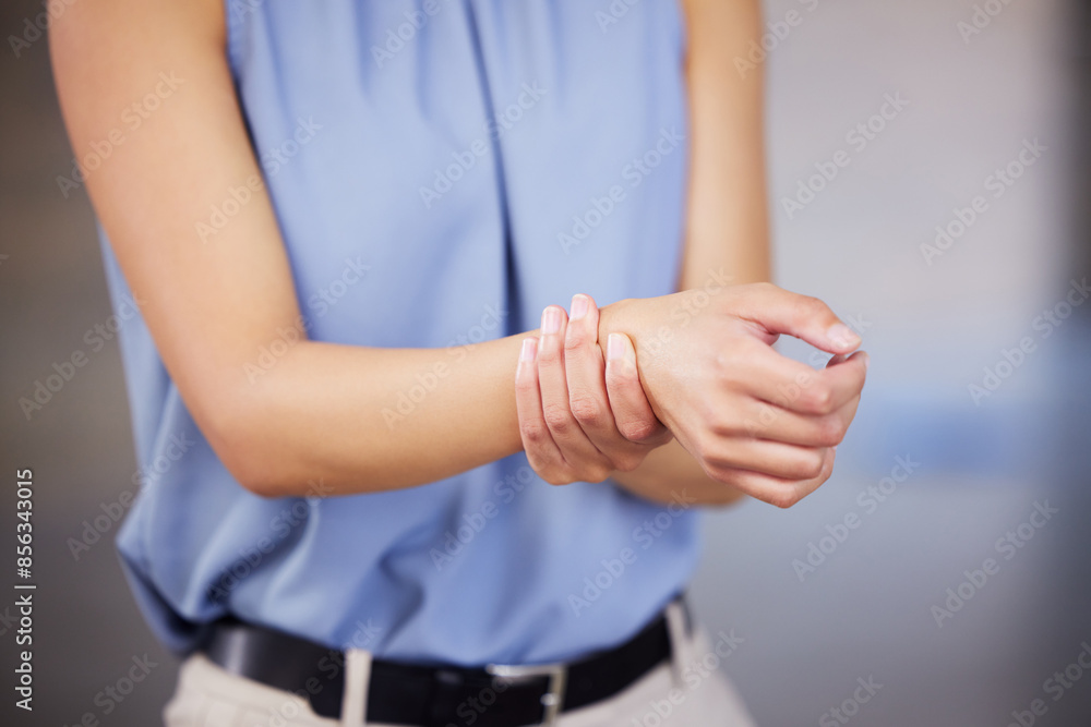 Obraz premium Wrist pain, woman and carpal tunnel with interior design worker, injury and issue in office. Company, arthritis and hand problem with architect at creative agency with hurt and pressure on joint