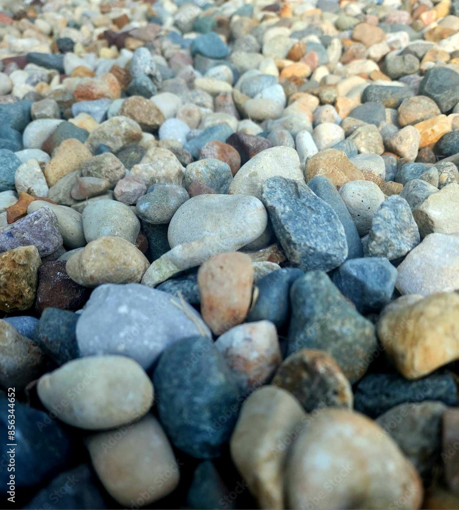 Small smooth pebbles at the beach Small smooth pebbles at the beach