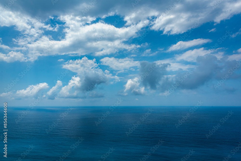 blue sea and sky with clouds blue sea and sky with clouds