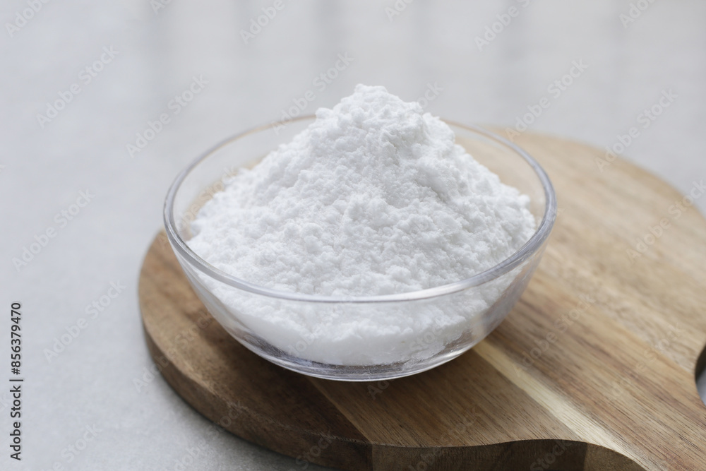 Bowl of baking soda, Sodium bicarbonate powder Bowl of baking soda, Sodium bicarbonate powder