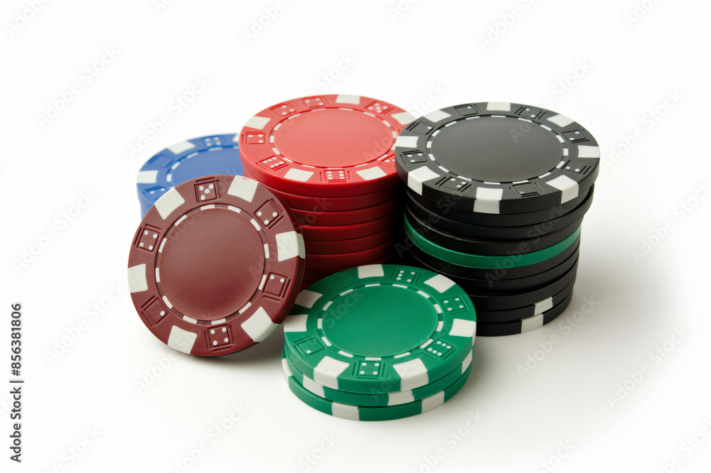 Vibrant assortment of red, blue, black, and green poker chips neatly stacked against a crisp white backdrop, symbolizing casino gambling Vibrant assortment of red, blue, black, and green poker chips neatly stacked against a crisp white backdrop, symbolizing casino gambling