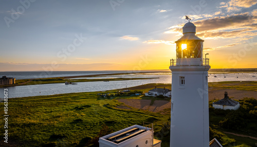 Photos Sunset view of Hurst Point Lighthouse is located at Hurst Point in the English c