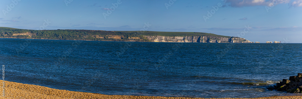View of the Needles, a row of three stacks of chalk that rise about 30 metres out of the sea off the western extremity of the Isle of Wight in the English Channel View of the Needles, a row of three stacks of chalk that rise about 30 metres out of the sea off the western extremity of the Isle of Wight in the English Channel