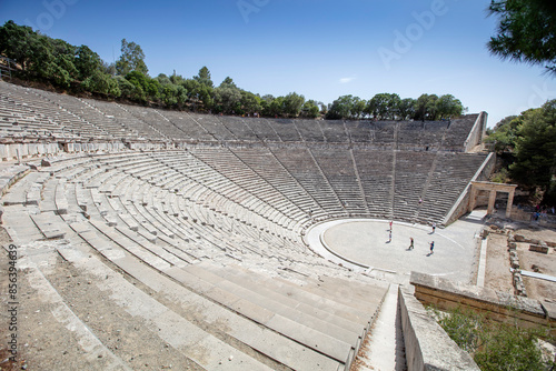 The Epidaurus Ancient Theatre is a theatre in the Greek old city of Epidaurus dedicated to the ancient Greek God of medicine, Asclepius. photo