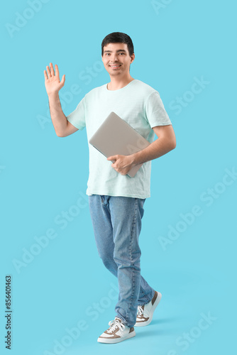 Male programmer with laptop...