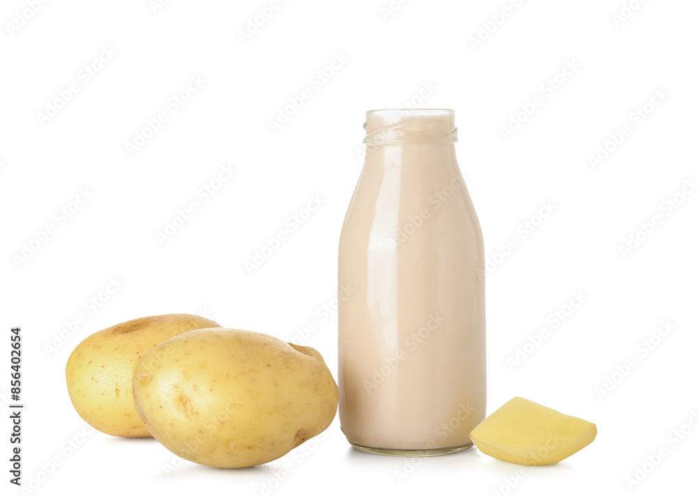 Bottle of tasty potato milk on white background Bottle of tasty potato milk on white background
