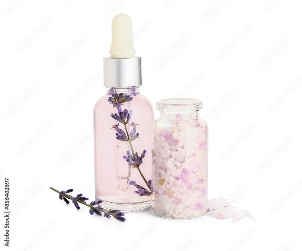 Bottle of lavender essential oil and sea salt on white background