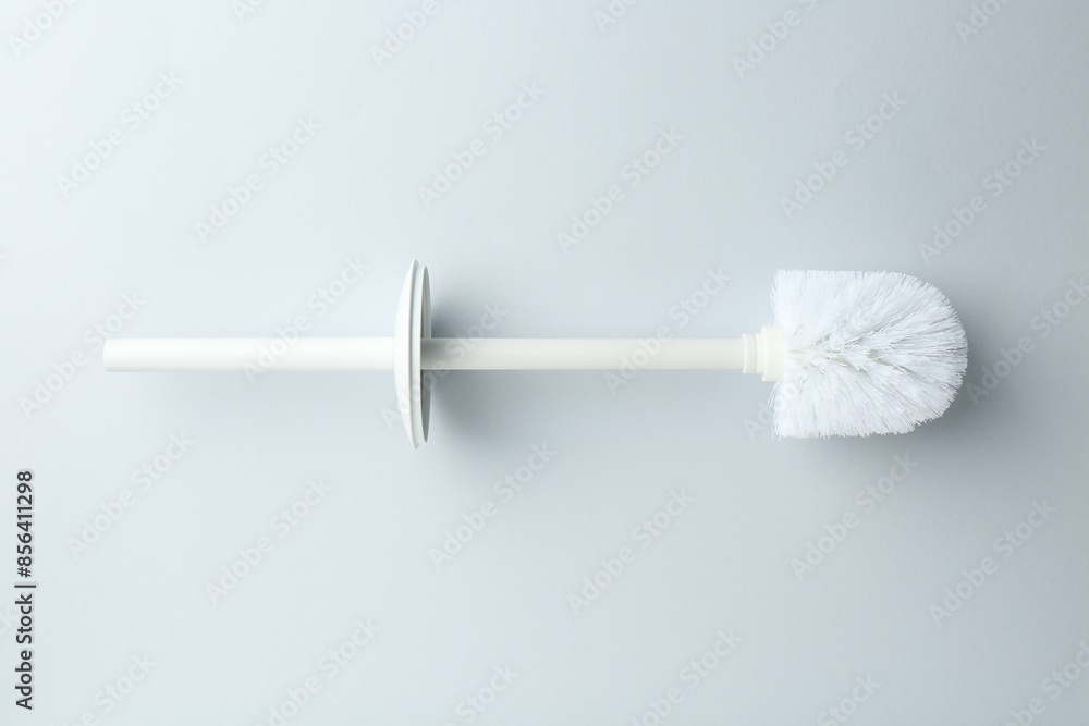 One toilet brush on white background, top view One toilet brush on white background, top view