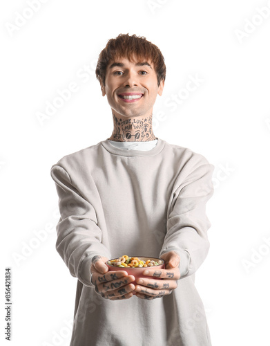 Man holding bowl with cerea...
