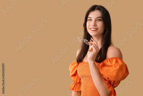 Beautiful young happy woman...