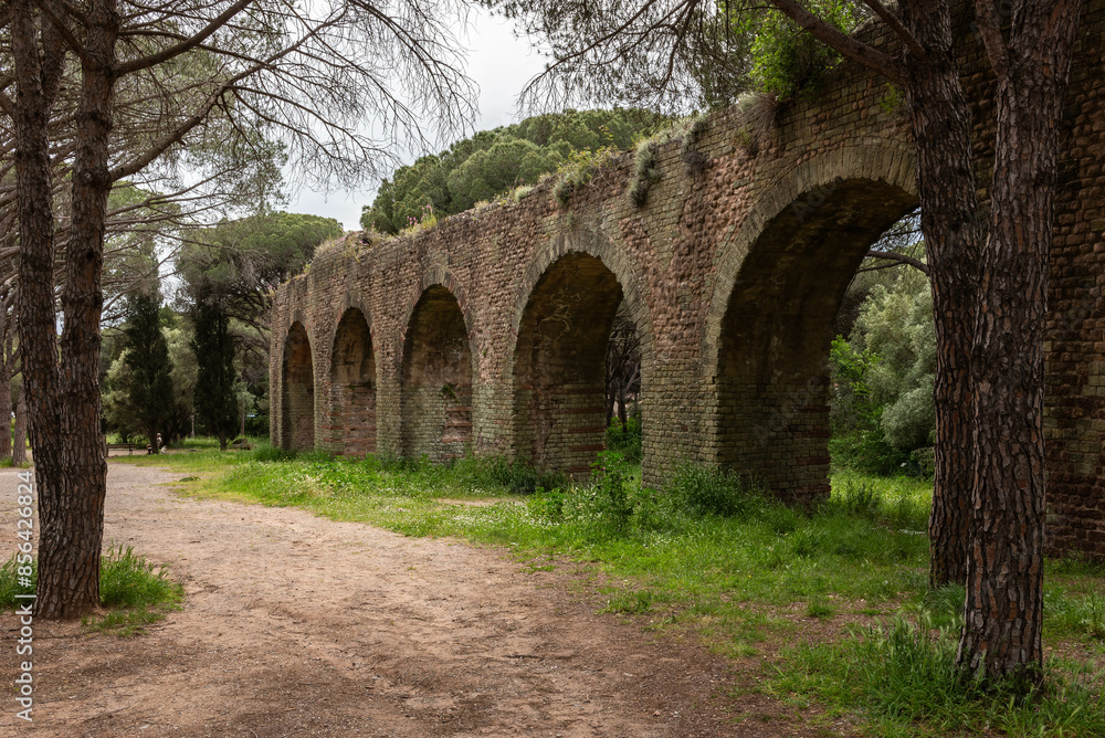Ancient Roman aqueduct in the Aurelien public park of Frejus (Frejus, Var, Provence-Alpes-Cote-d’Azur, France) Ancient Roman aqueduct in the Aurelien public park of Frejus (Frejus, Var, Provence-Alpes-Cote-d’Azur, France)