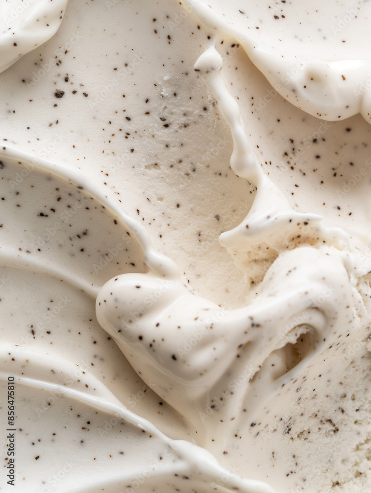 A closeup image of decadent bourbon vanilla bean ice cream, its creamy texture and speckled appearance highlighted against a pure white background A closeup image of decadent bourbon vanilla bean ice cream, its creamy texture and speckled appearance highlighted against a pure white background