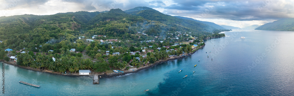 Fototapeta premium The scenic, tropical island of Alor is fringed by coral reef and black sand slopes in eastern Indonesia. This area is part of the Coral Triangle and is home to spectacularly diverse coral reefs.