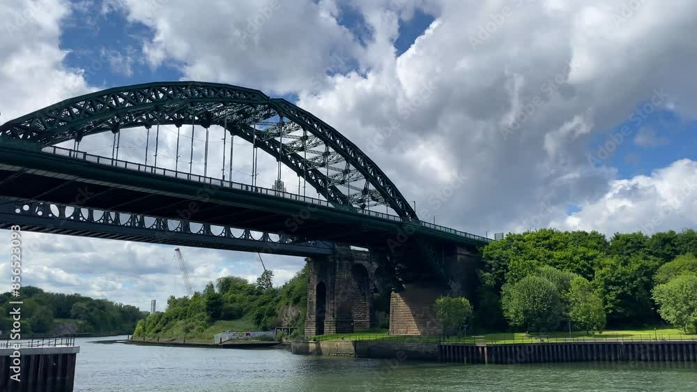 Wearmouth Bridge from bank of River Wear in City of Sunderland, UK. Panning. Wearmouth Bridge from bank of River Wear in City of Sunderland, UK. Panning.