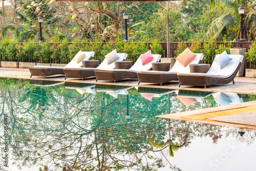 Colorful sunbed around the pool in Thailand
