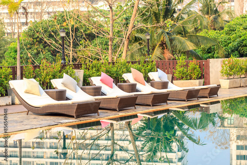 Colorful sunbed around the pool in Thailand