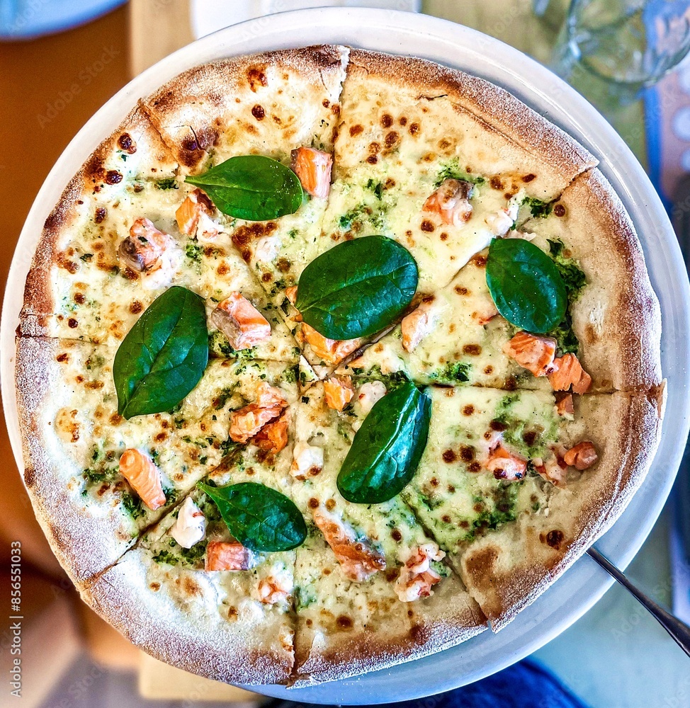Vegetarian pizza on a table in a restaurant