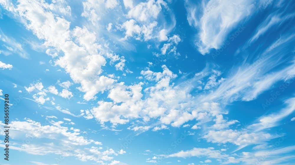 Soft focus blue sky with white clouds and horizontal copy space Soft focus blue sky with white clouds and horizontal copy space