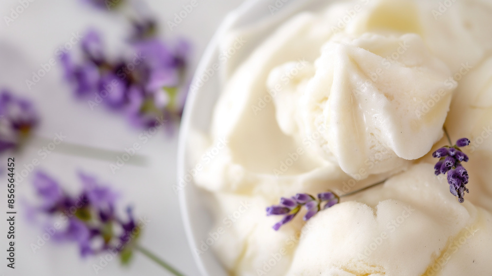 Chic honey lavender sorbet, a closeup of chic honey lavender sorbet, its pale color and floral notes set against a white background Chic honey lavender sorbet, a closeup of chic honey lavender sorbet, its pale color and floral notes set against a white background