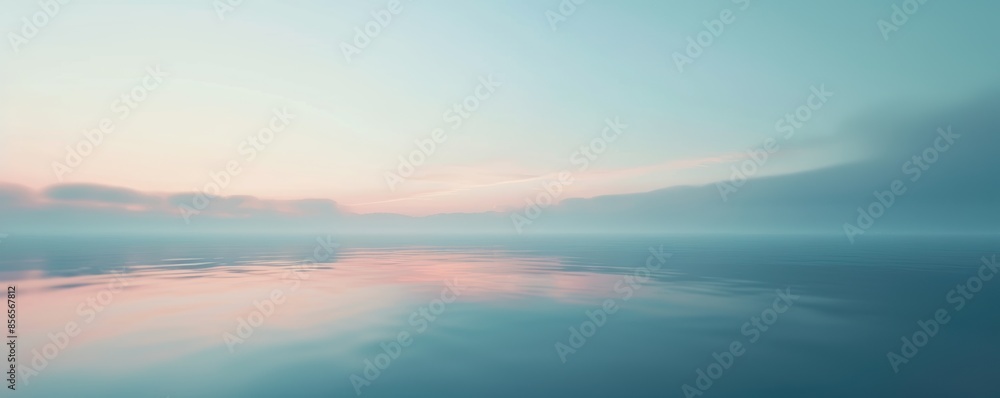 Serene seascape with a pastel-colored sky reflected on calm ocean waters at sunset, creating a peaceful and tranquil atmosphere.