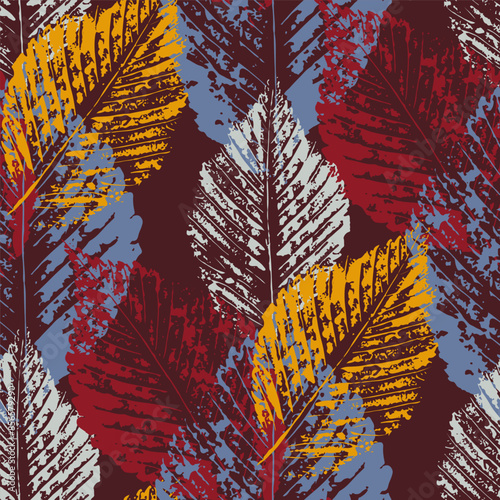 autumn seamless pattern of multicolored leaf prints