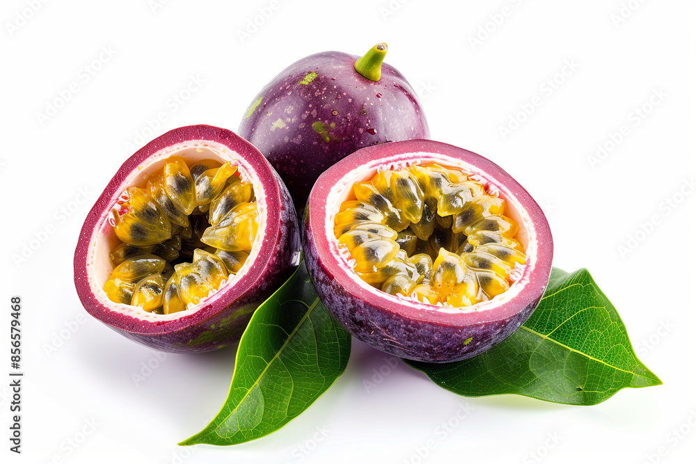 Purple passion fruit (Passiflora edulis) cut in half with a green leaf, isolated on white background Purple passion fruit (Passiflora edulis) cut in half with a green leaf, isolated on white background