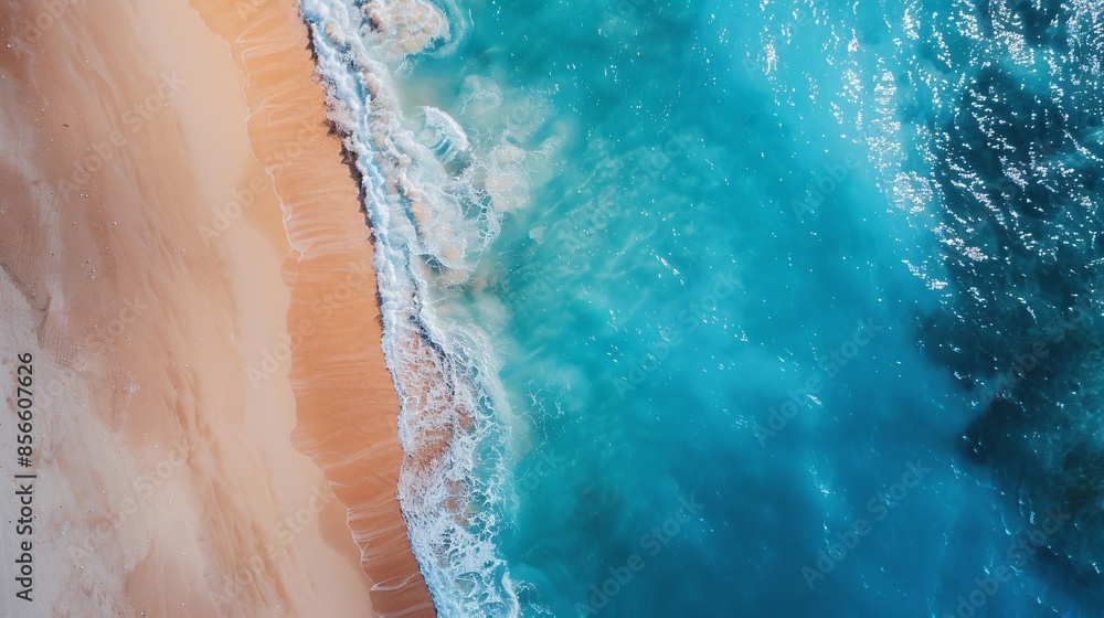 Aerial View of a Sandy Beach Meeting the Turquoise Ocean Aerial View of a Sandy Beach Meeting the Turquoise Ocean