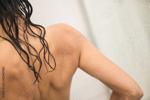 Wallpaper Mural Waist up picture of long-haired woman having a shower Torontodigital.ca