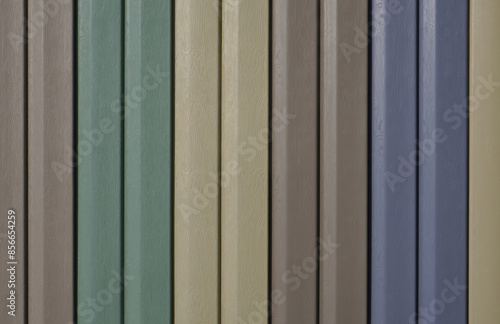 samples of siding for decorating walls from the outside. building background. samples of vinyl panels for building facades. a set of siding in different colors on display.