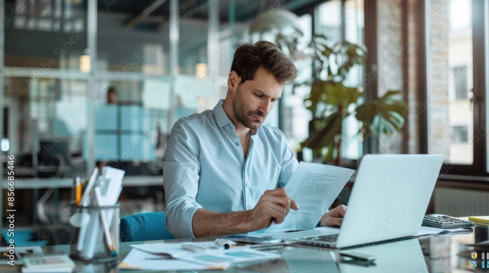 The businessman analyzing documents The businessman analyzing documents