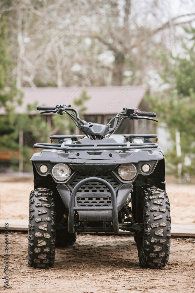 Fototapeta premium Powerful modern black all terrain vehicle for tourist's enjoyment