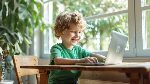 The child using a laptop © MP Studio