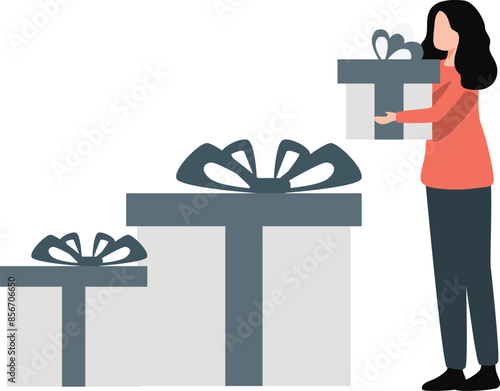 The girl is standing near gifts