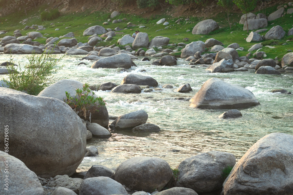 water flowing with rocks in the river water flowing with rocks in the river