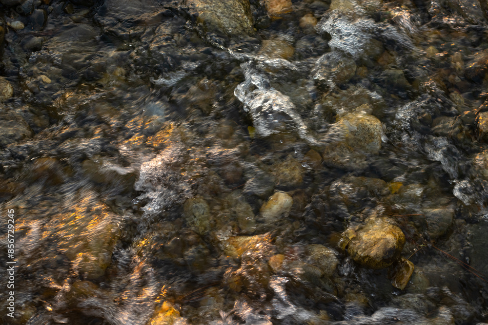 Water flowing over the rocks top view Water flowing over the rocks top view