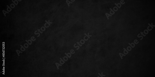 Abstract black stone wall texture grunge rock surface. Old wall stone for dark black distressed grunge background wallpaper. rough concrete wall. dark gray background backdrop. wide panoramic banner.