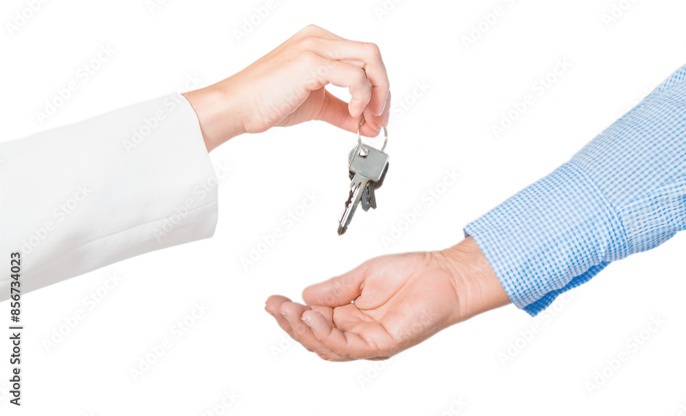 Isolated hand of a young business woman passing the key to the apartment. The hand of an elderly woman takes the key. Isolated hand of a young business woman passing the key to the apartment. The hand of an elderly woman takes the key.