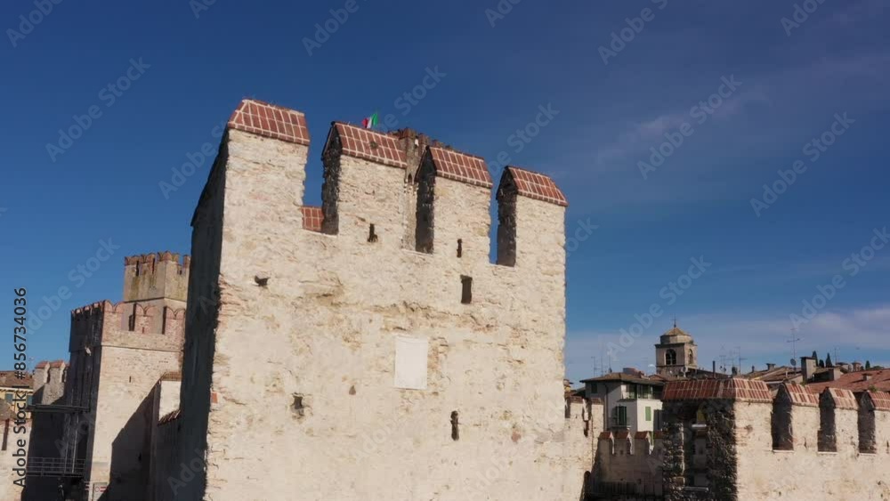 Castello Scaligero di Sirmione, town of Sirmione on Lake Garda aerial view video. Scaliger Castle of the city of Sirmione 4K video on drone. Cinematic 4K aerial drone Scaligero Castle of Sirmione. Castello Scaligero di Sirmione, town of Sirmione on Lake Garda aerial view video. Scaliger Castle of the city of Sirmione 4K video on drone. Cinematic 4K aerial drone Scaligero Castle of Sirmione.
