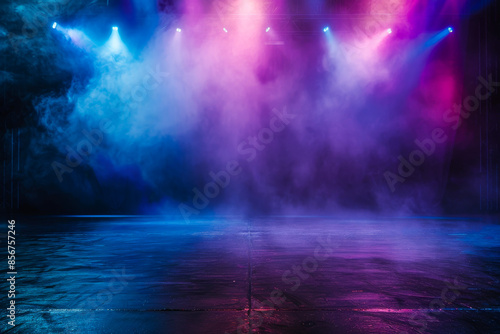 stage is bathed in colorful spotlights and filled with thick smoke