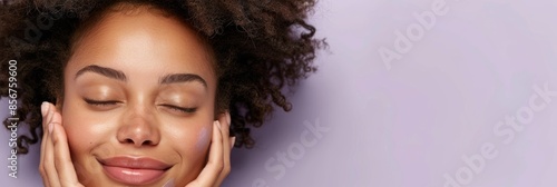 An isolated picture of a black woman with radiant skin, makeup thoughts, and studio space. Dermatology and luxury cosmetics isolated on purple background with glowing skin, makeup thoughts, and