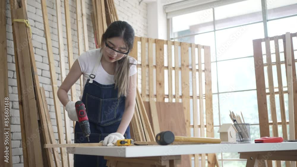 Carpenter is working at woodshop. Carpenter is working at woodshop.