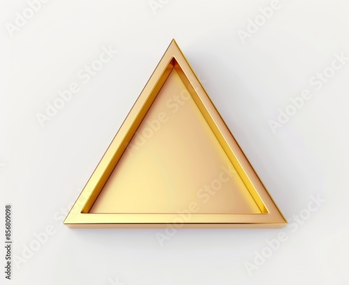 A golden triangle sits on a white background, its smooth surface catching the light. The simple design creates a feeling of elegance and sophistication