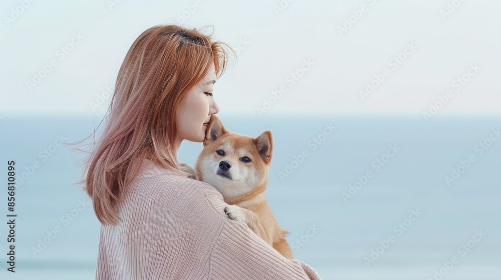 Coastal Companionship: Woman And Shiba Inu Embrace By The Sea Coastal Companionship: Woman And Shiba Inu Embrace By The Sea