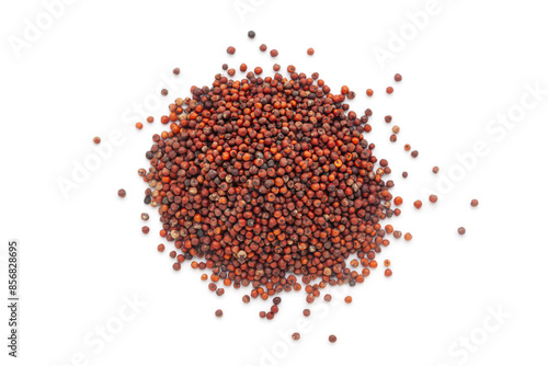 A close-up pile of organic Ragi (Eleusine coracana) or Finger Millet, isolated on a white background. Top view photo